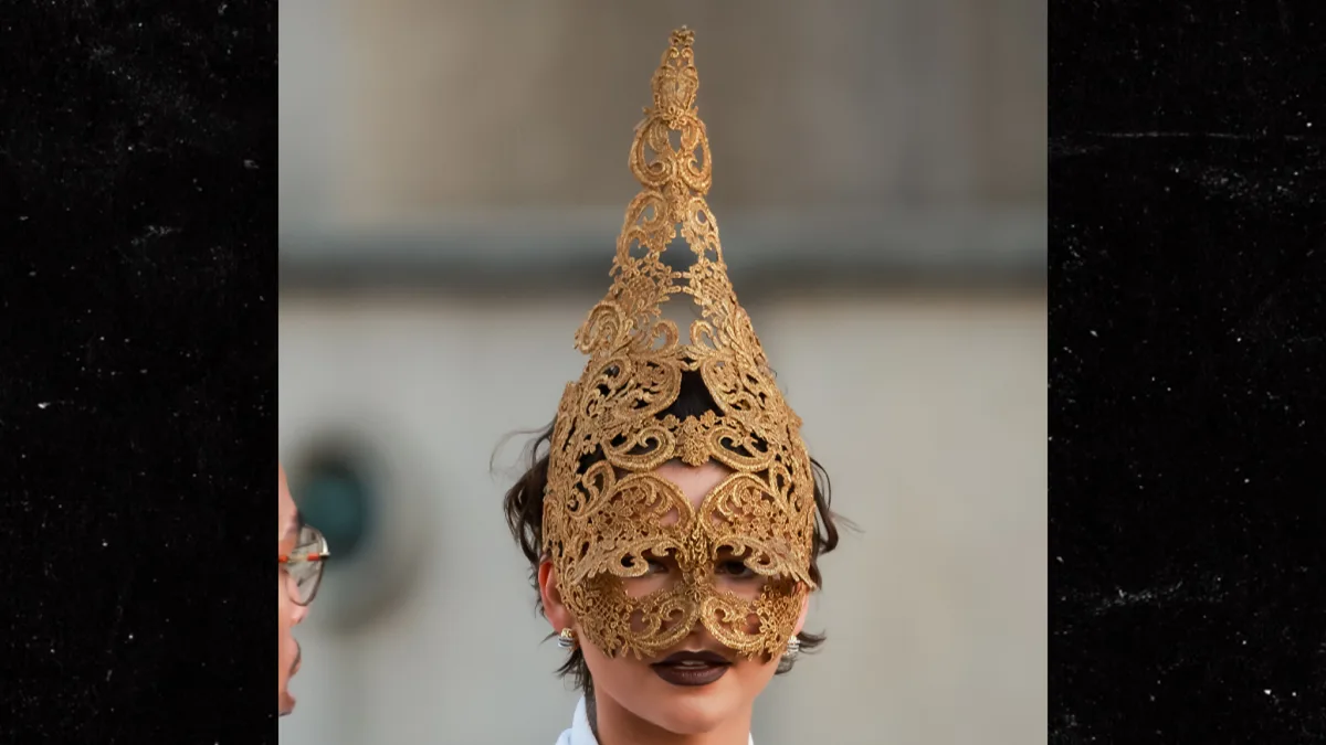 Zendaya Wears Gold Mask by Alexander McQueen at 'Odyssey' Paris Premiere