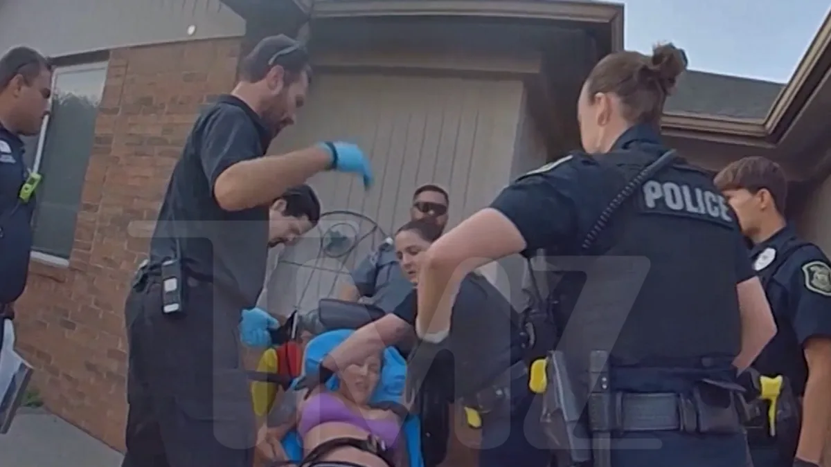Eminem's Ex-Wife Kim Scott Screams at Cops in Body Cam Video From Attempted Suicide